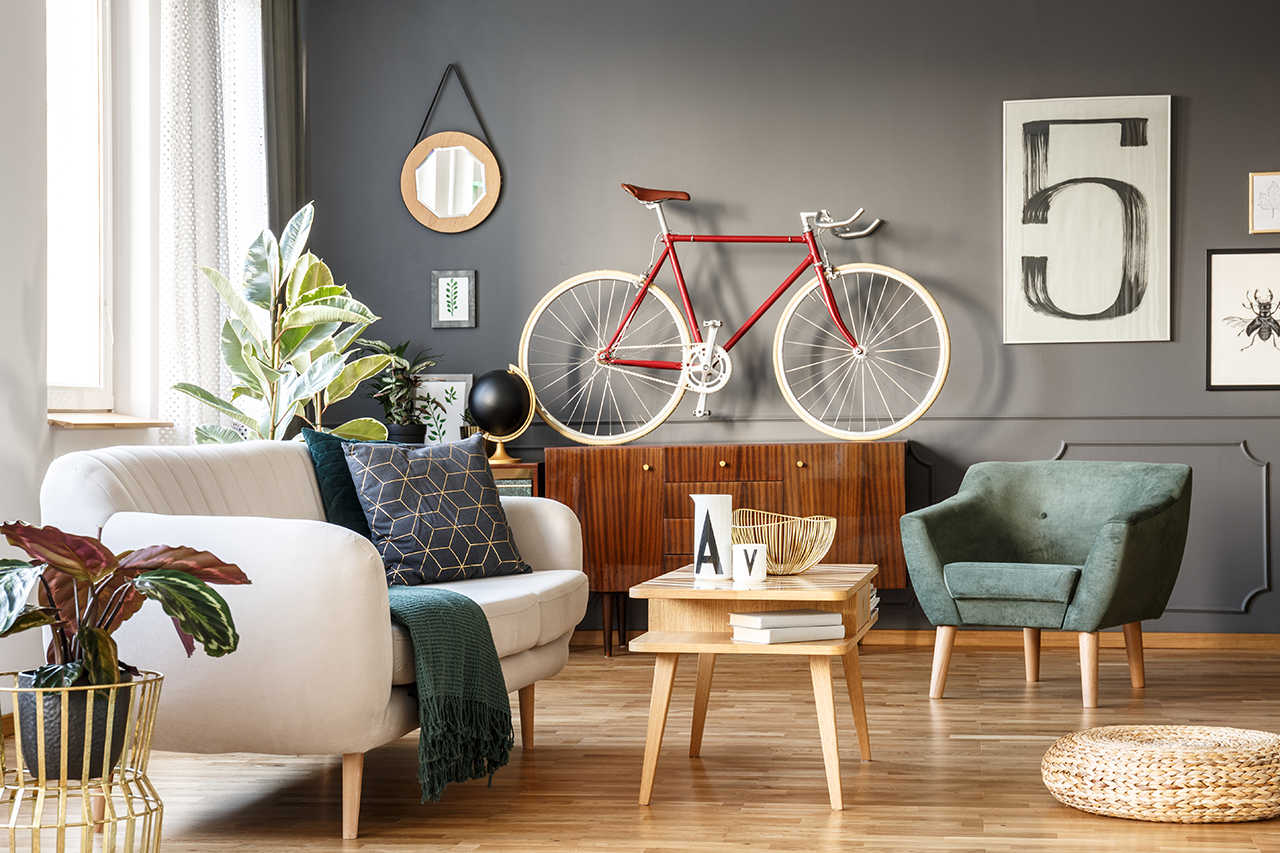 Large apartment with accents and a bike hanging on the wall